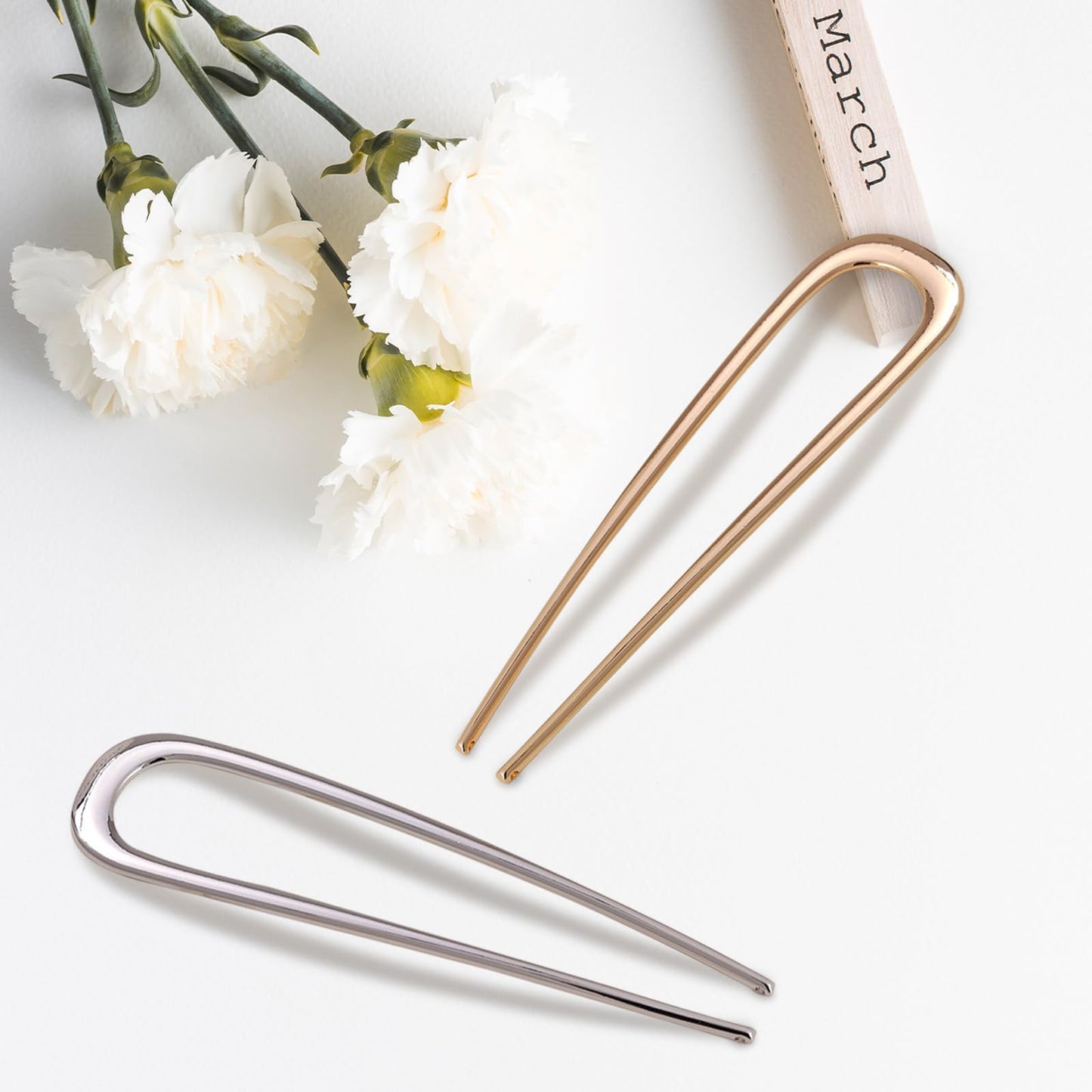 Premium imported U-shaped styling pins in gold and silver variations.