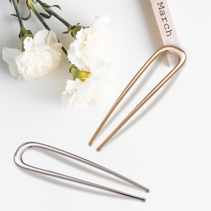 Premium imported U-shaped styling pins in gold and silver variations.