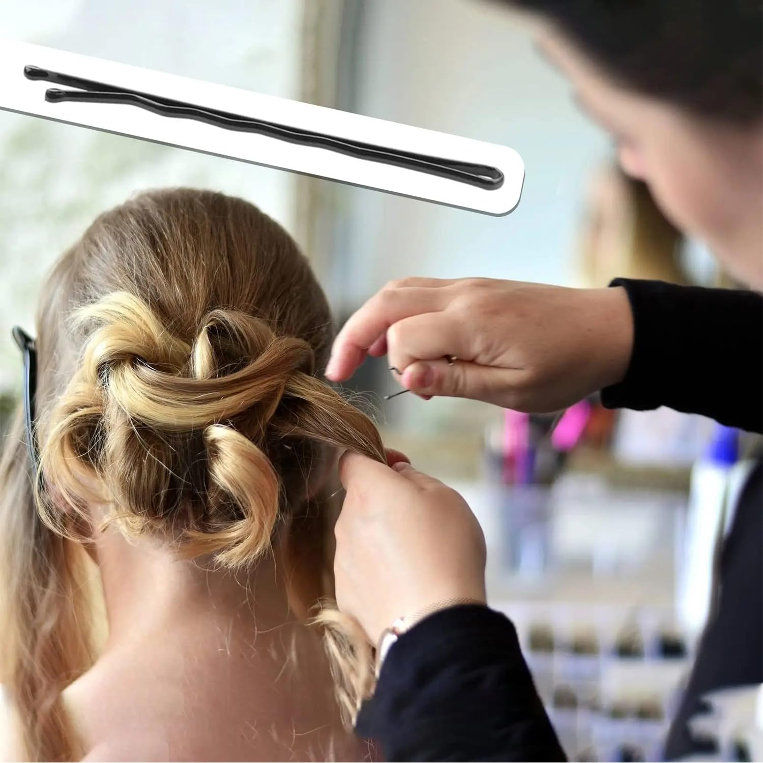 Compact clear plastic box filled with one hundred premium black hairpins