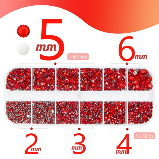 Close up of ruby red flatback resin rhinestones in assorted sizes