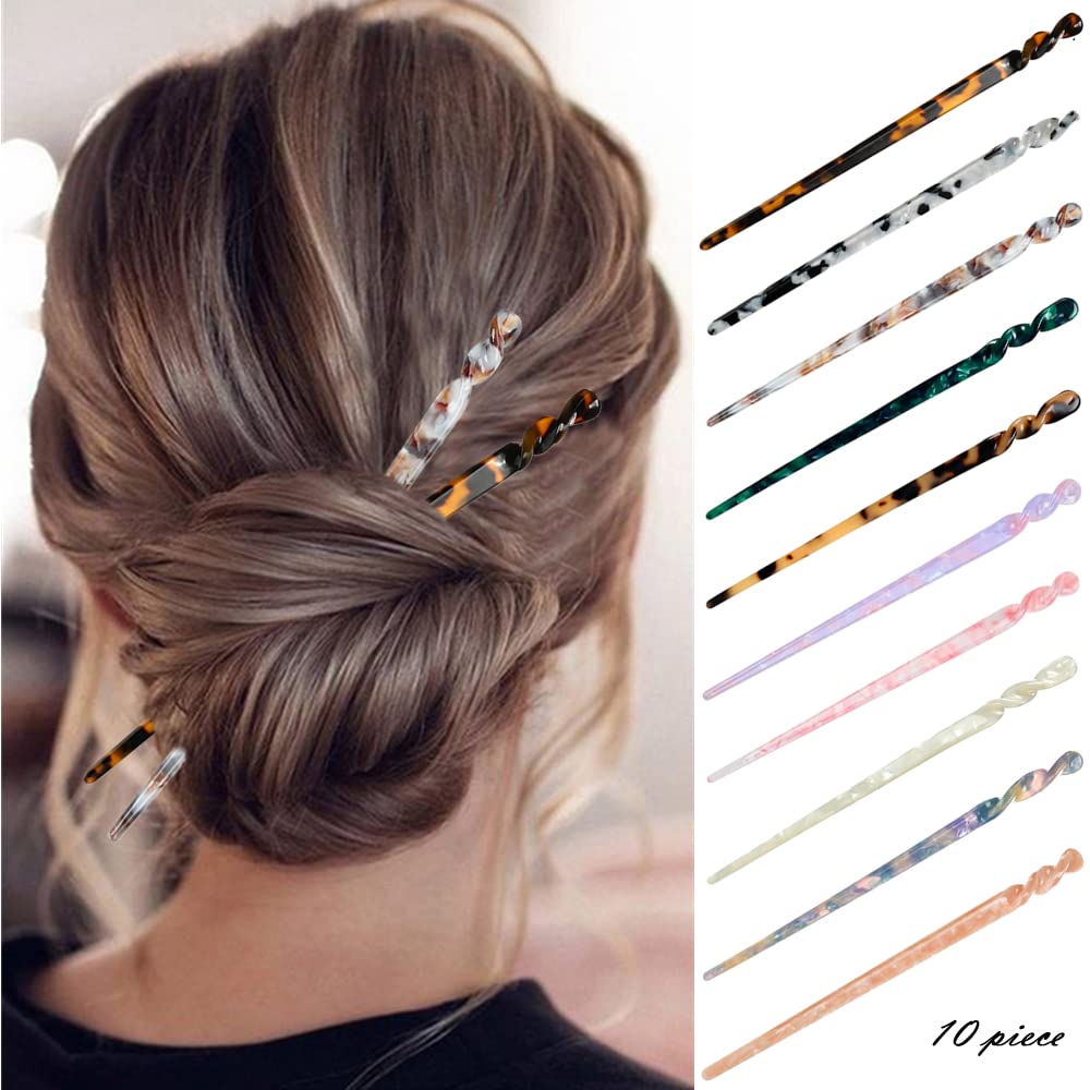 Close up of vintage cellulose acetate hair chopsticks in classic brown and cream tortoise shell patterns