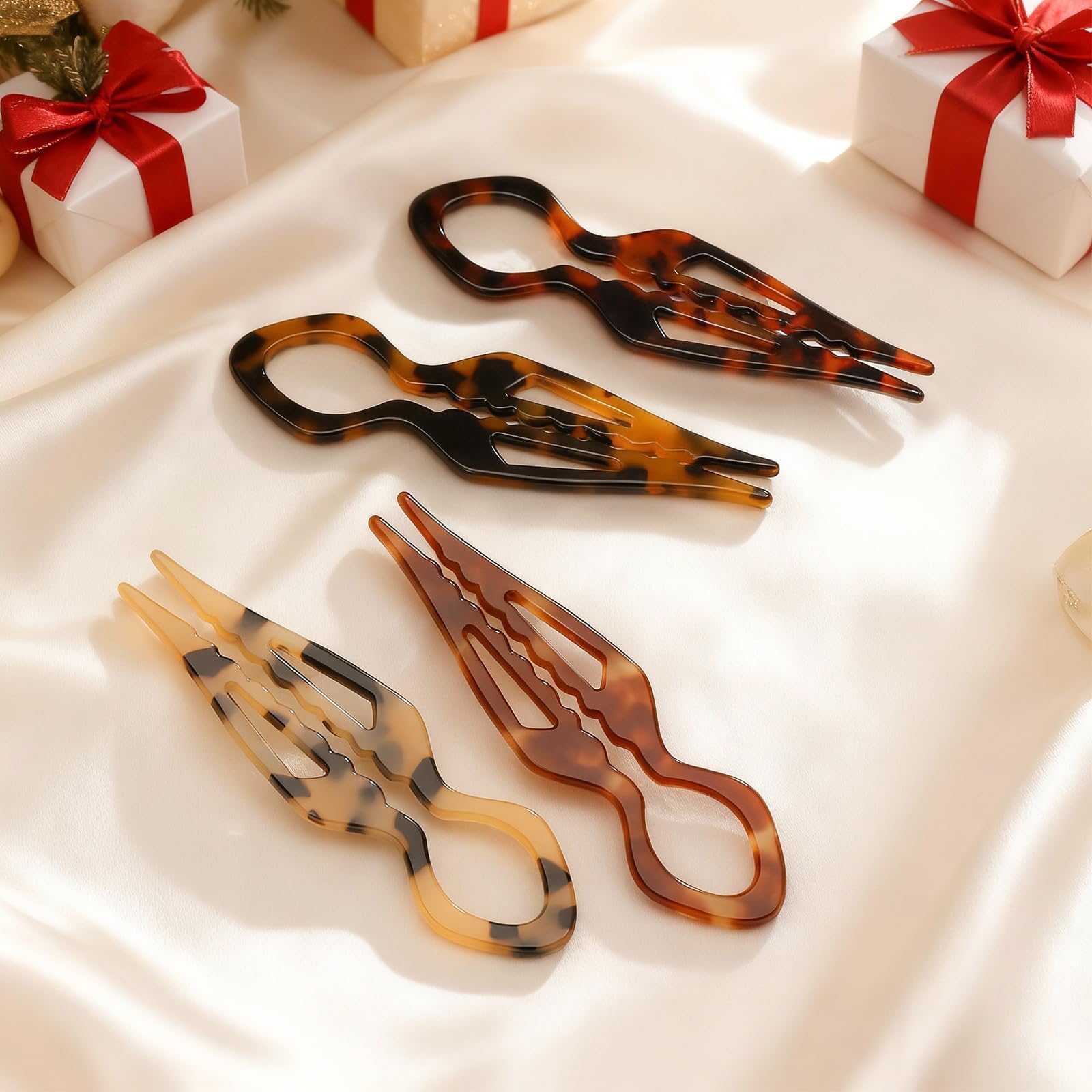 Serrated U-shaped acetate French twist pin close-up showing the inner dual-tooth structure for hair styling