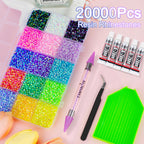 Close up view of multicolored 3mm flatback resin gems in storage compartments