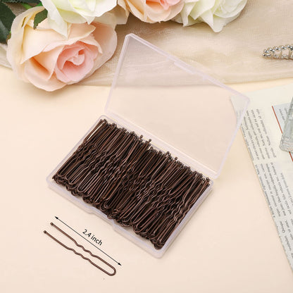 Close up view of two point four inch waved hair pins highlighting the protective smooth round tips.