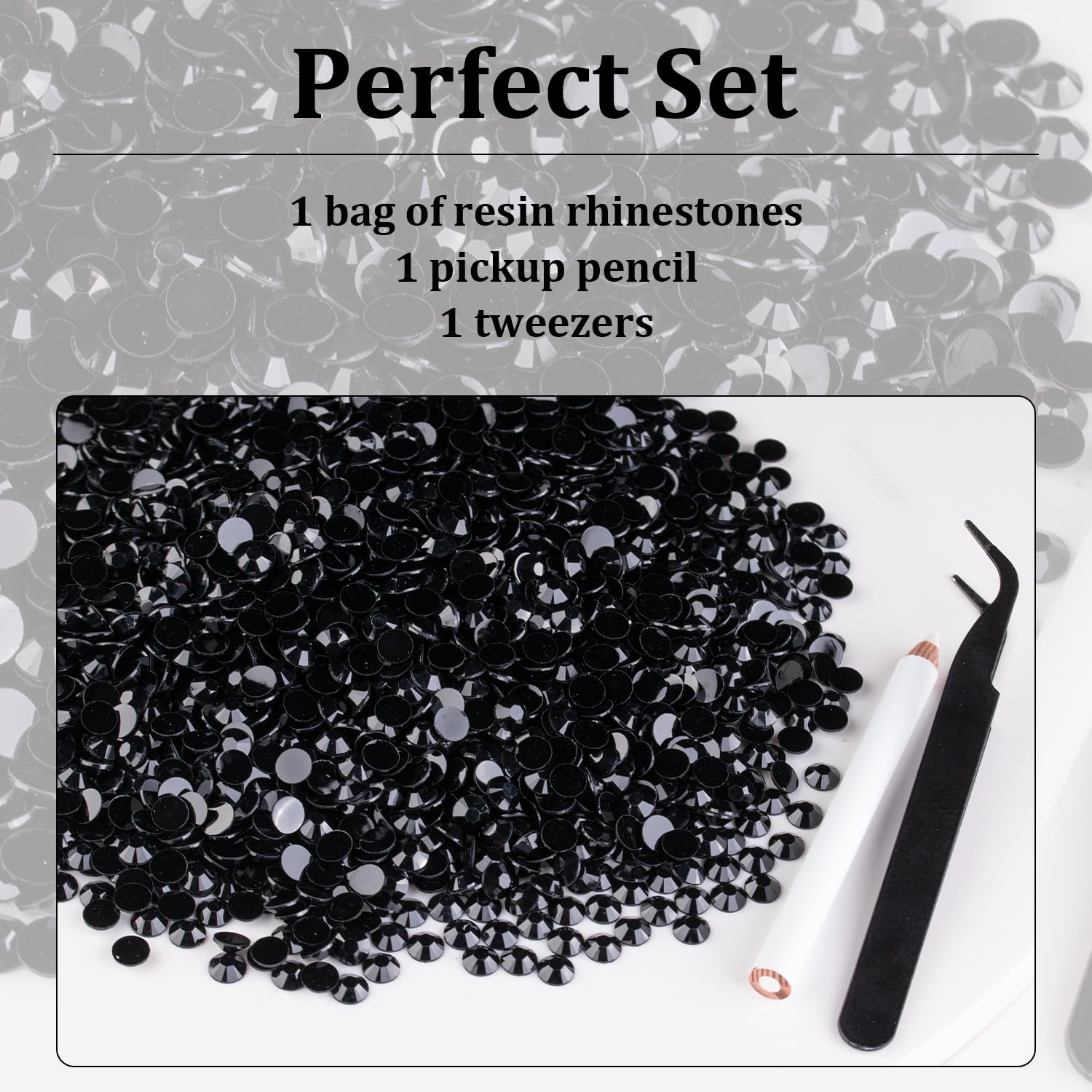 Hand holding wax pickup pencil applying black resin gems to nails