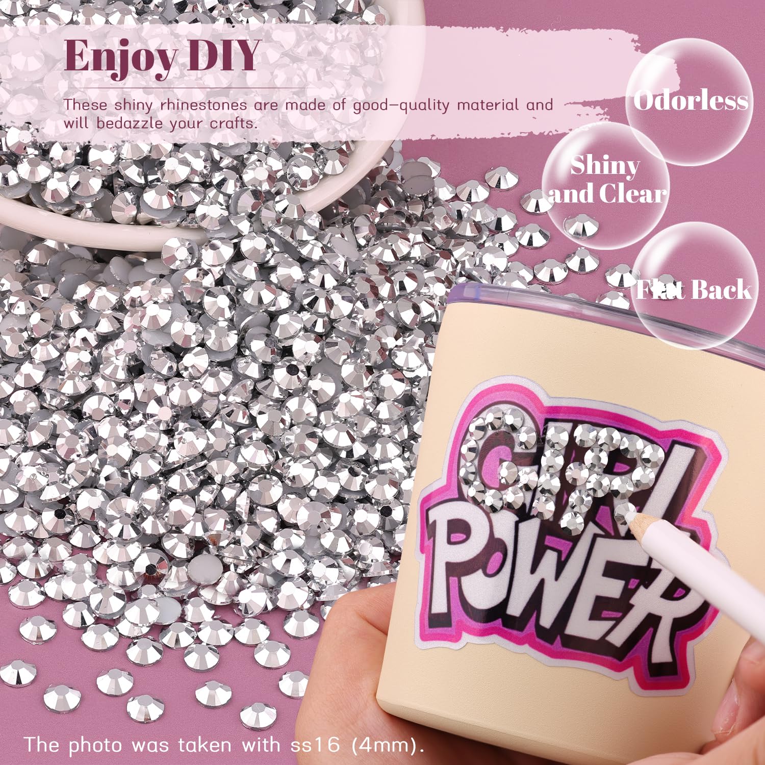 Hand holding pickup pen applying rhinestones to nail art