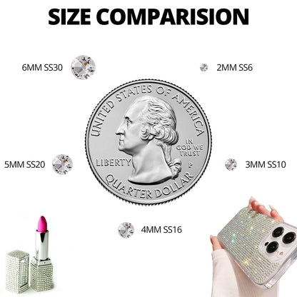 Hand using wax picker tool to apply rhinestones to a craft project
