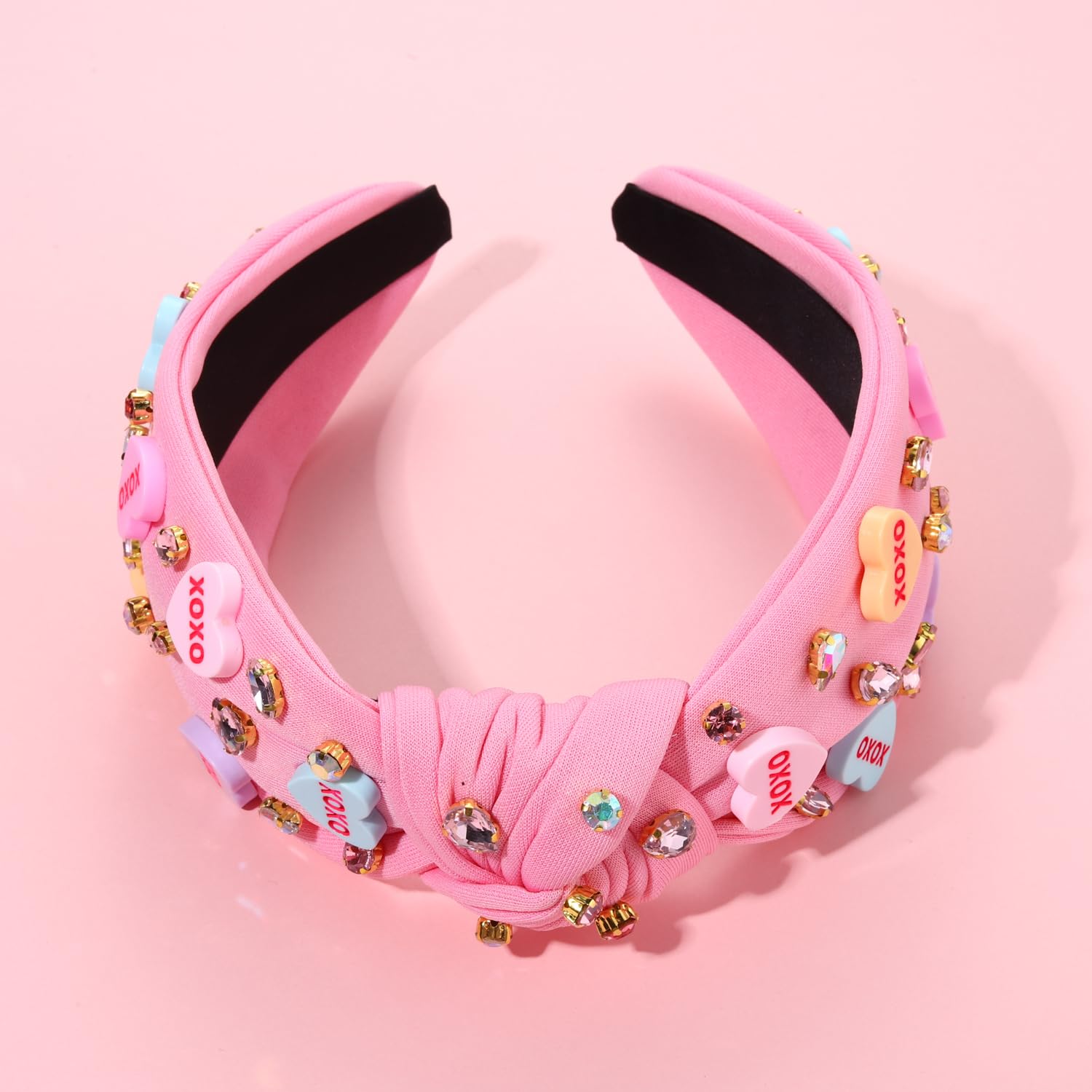Top view of knotted wide headband with rhinestones