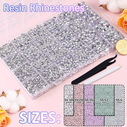 Close up view of silver clear flatback resin rhinestones in storage box