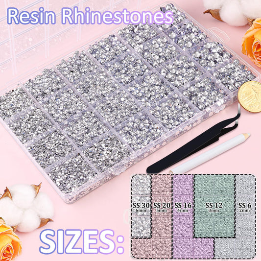 Close up view of silver clear flatback resin rhinestones in storage box