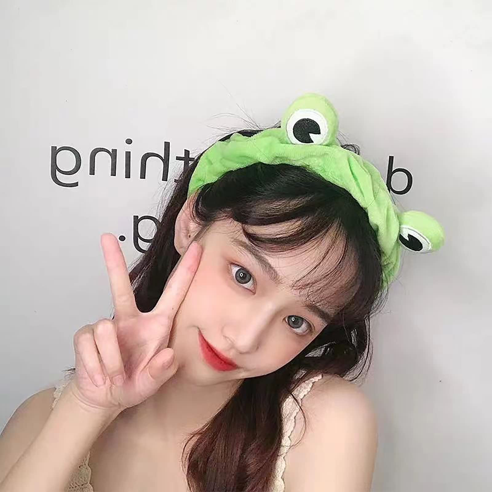 Side profile of Jowmoy cute frog headband spa accessory