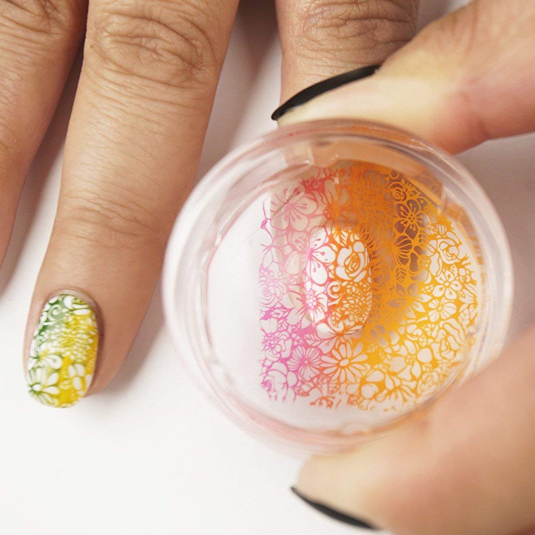 Close up of Maniology clear stamper head for precise nail art