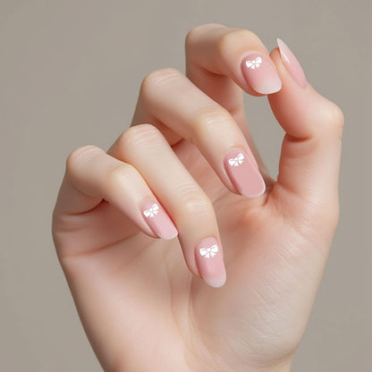 User demonstrating nail art stamping technique