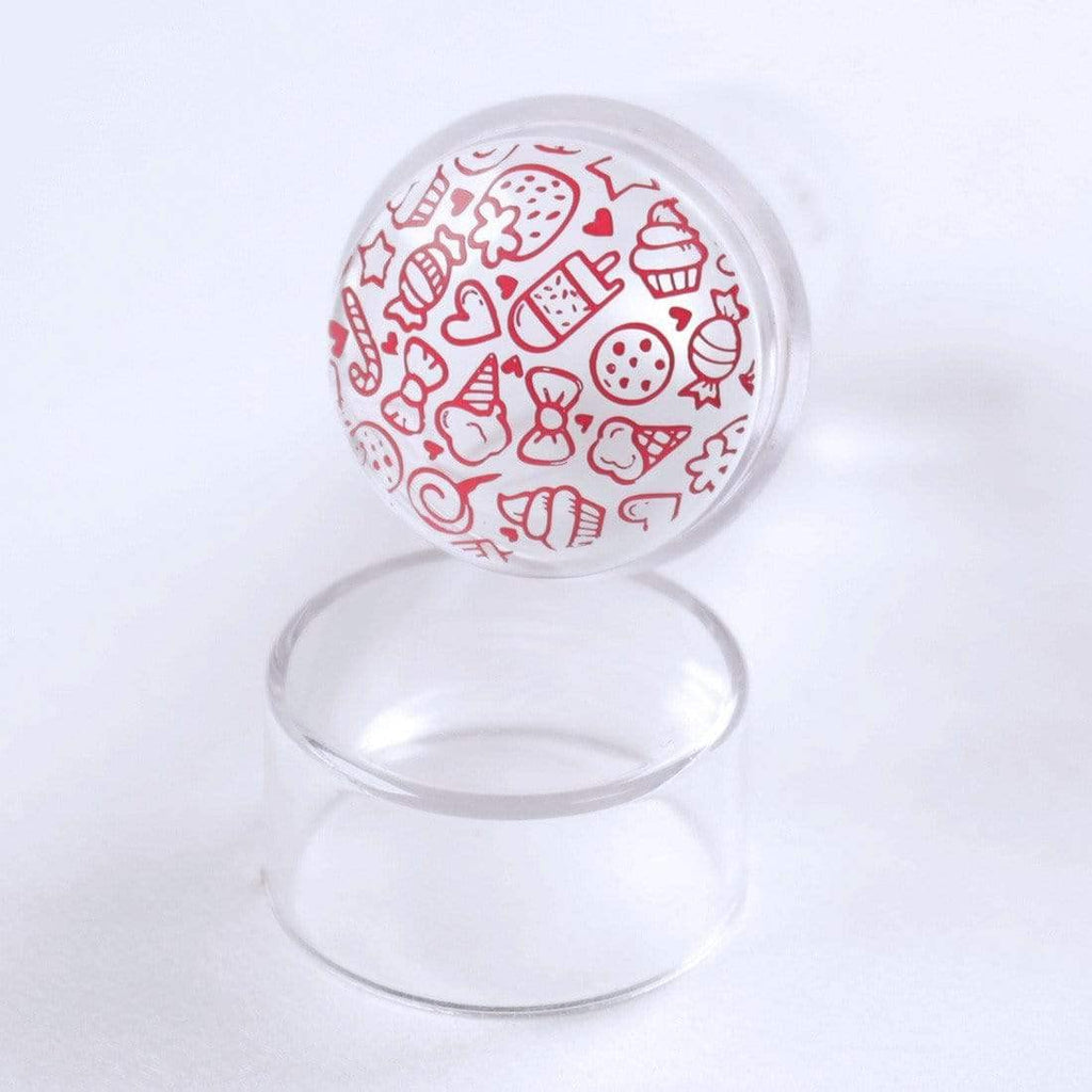 Transparent silicone stamper showing precision design placement