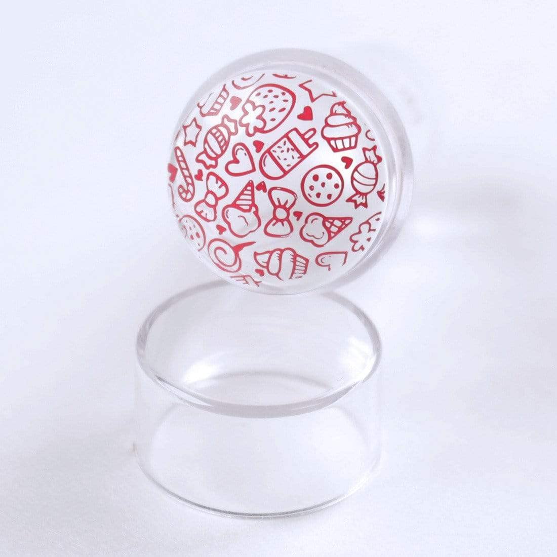 Transparent silicone stamper showing precision design placement