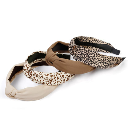 Close up of beige and brown leopard print knot headbands