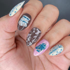 Close up of witchy nail art designs on Maniology stainless steel plate