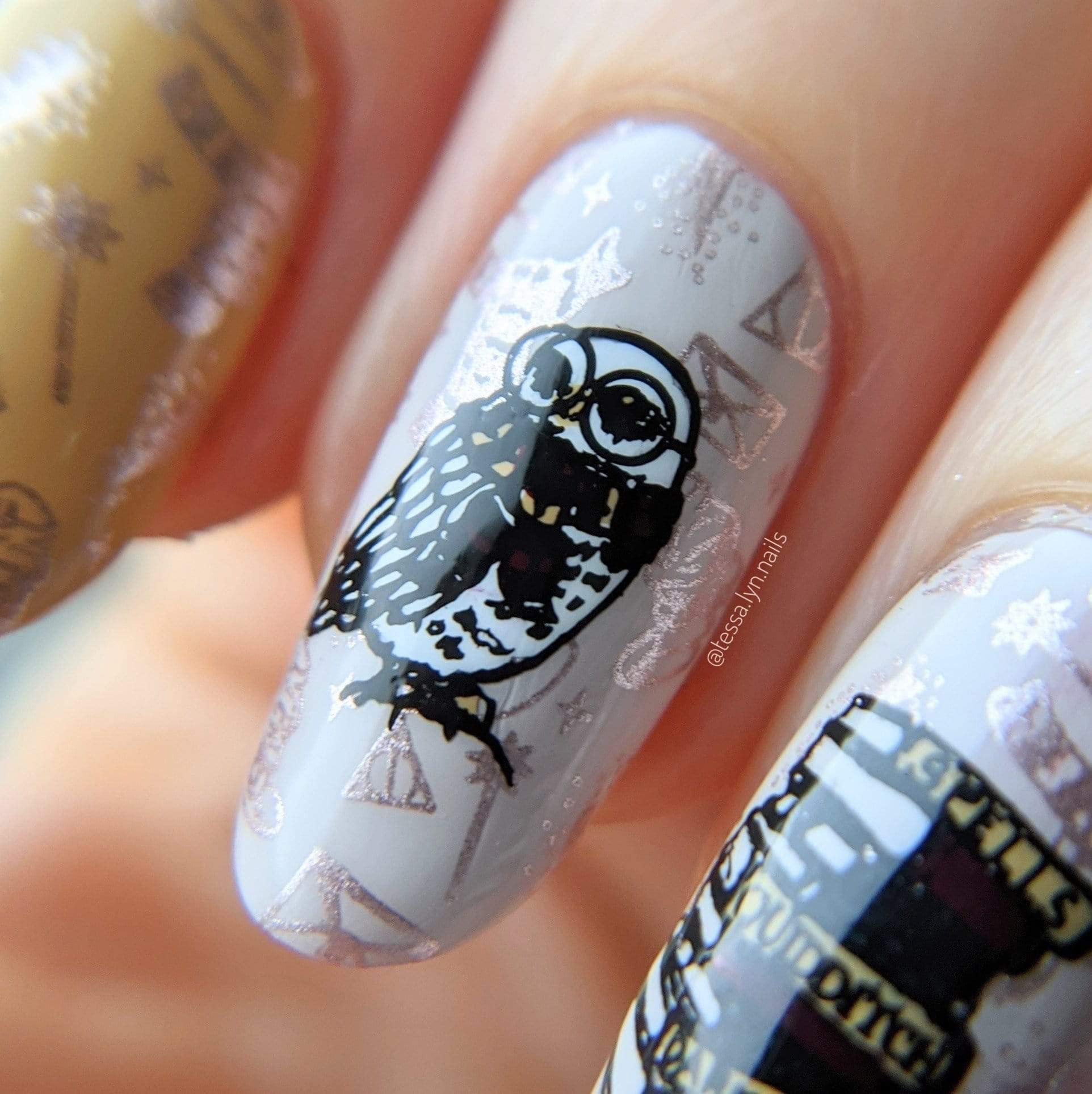 Rectangular stainless steel nail stamping plate with magical motifs