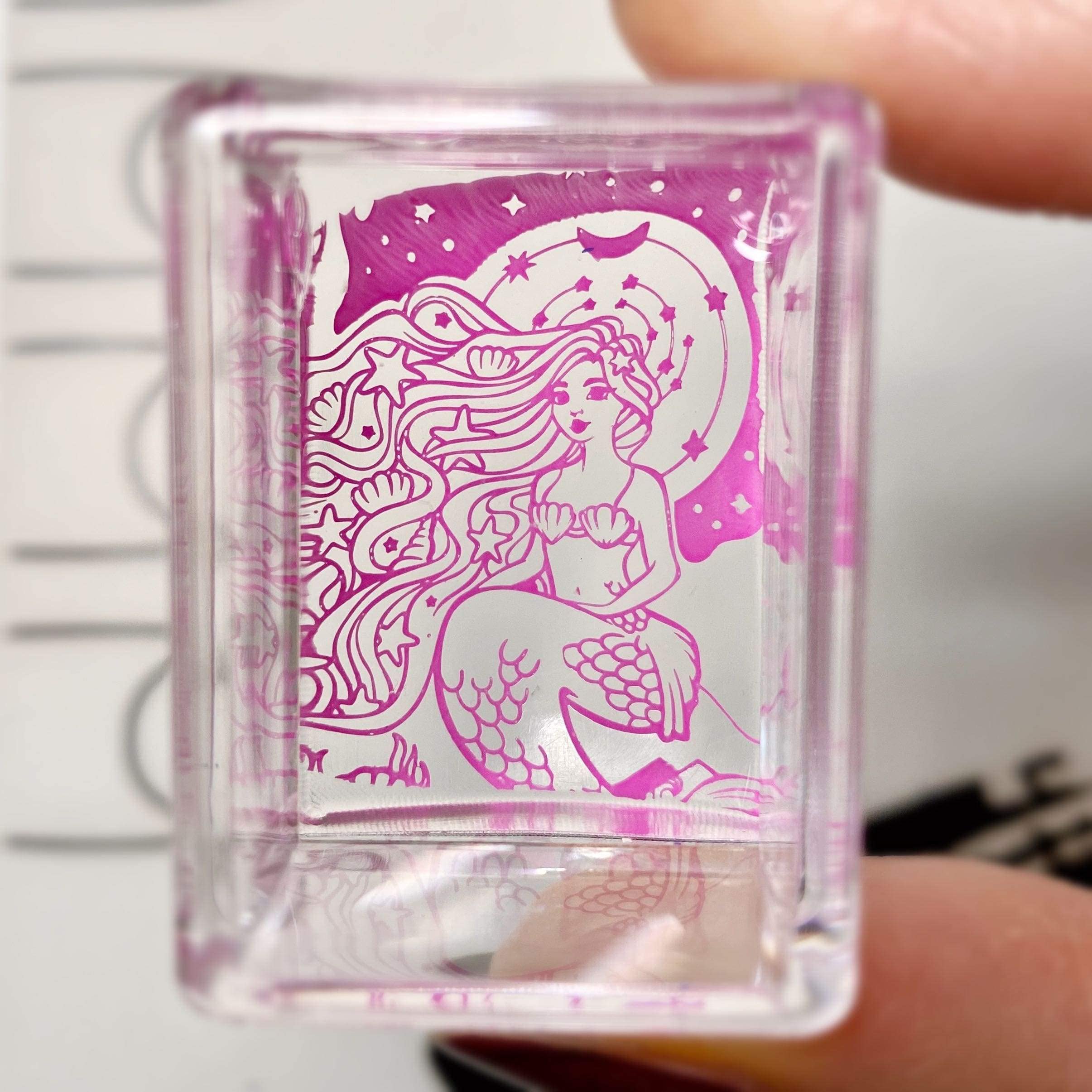 Top view of Maniology clear stamper with protective cap