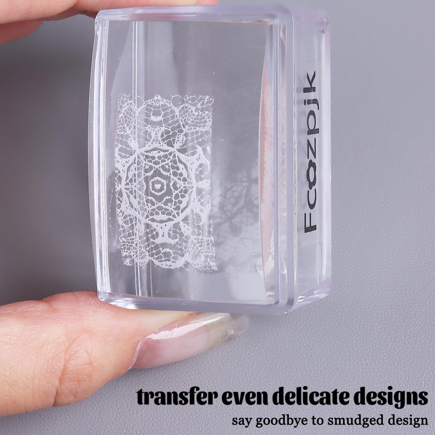 Using clear silicone stamper to apply white French tip polish