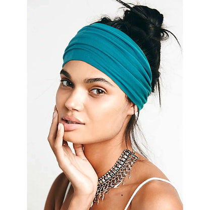 Close up of Jesries cross knotted wide turban headband