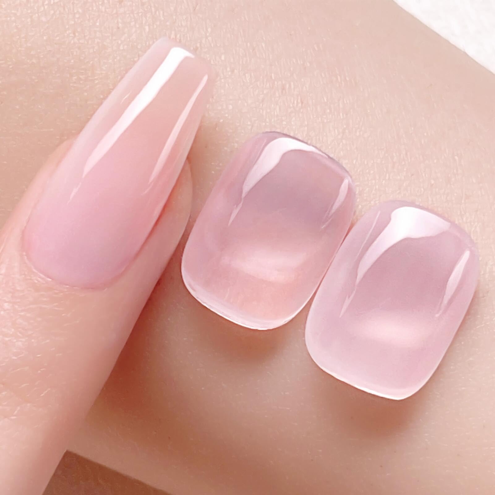 Close up of Born Pretty jelly pink and white gel polish bottles