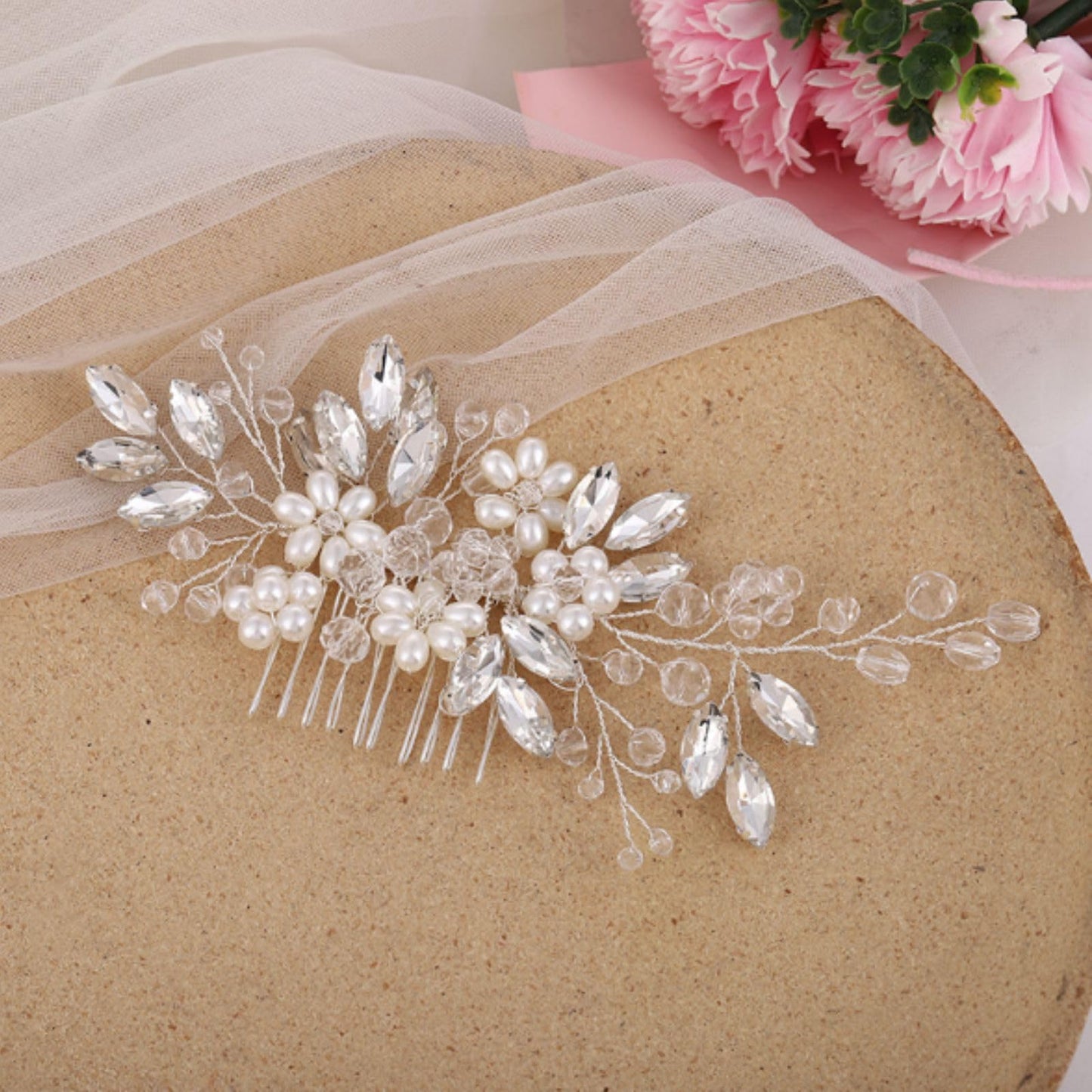 Flexible alloy wire bridal headpiece with shimmering crystal petals angled view.