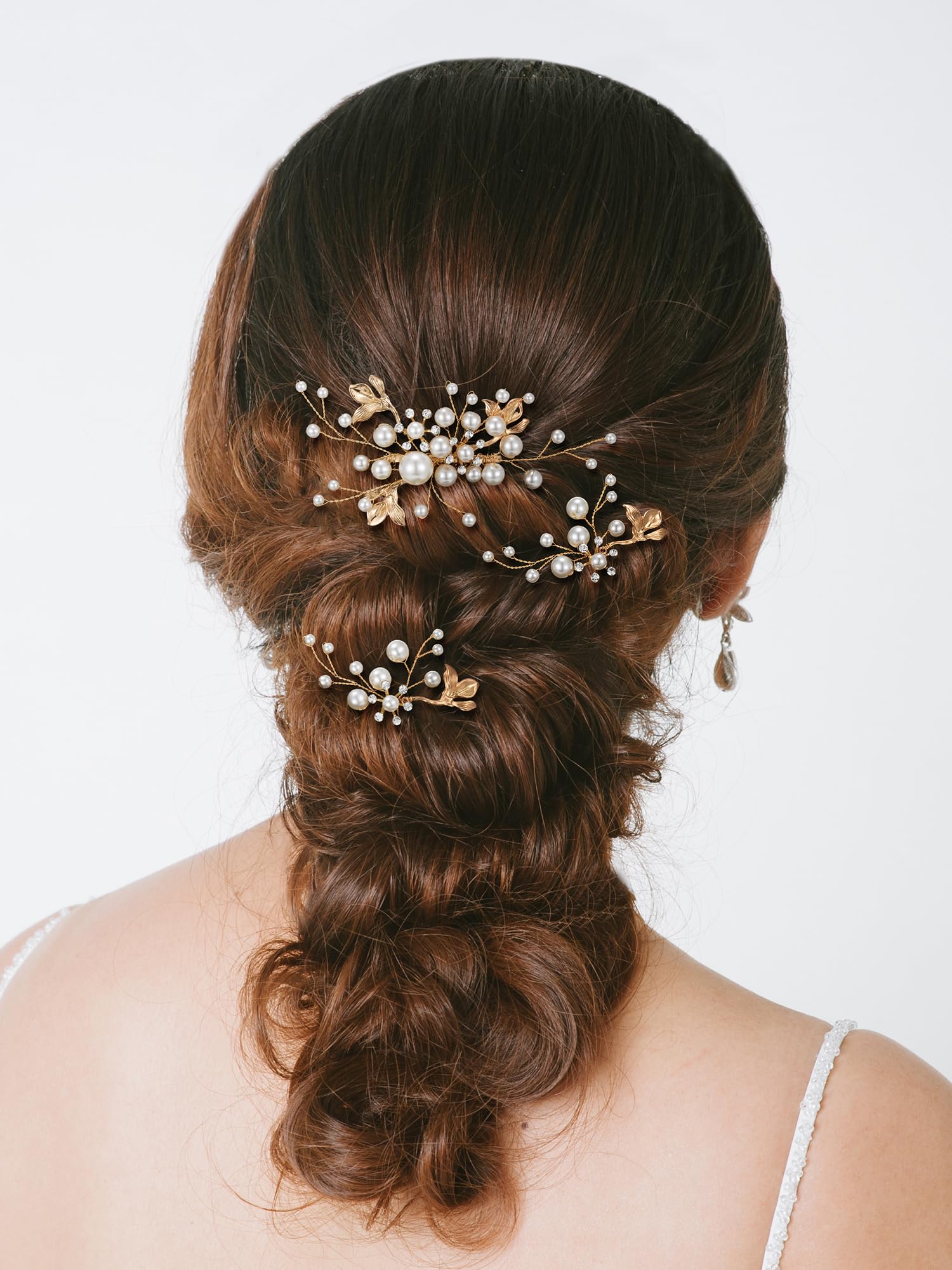 Detailed view of the hand wired pearls and crystals on SWEETV wedding headpieces