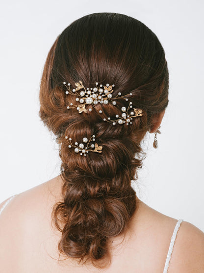 Detailed view of the hand wired pearls and crystals on SWEETV wedding headpieces