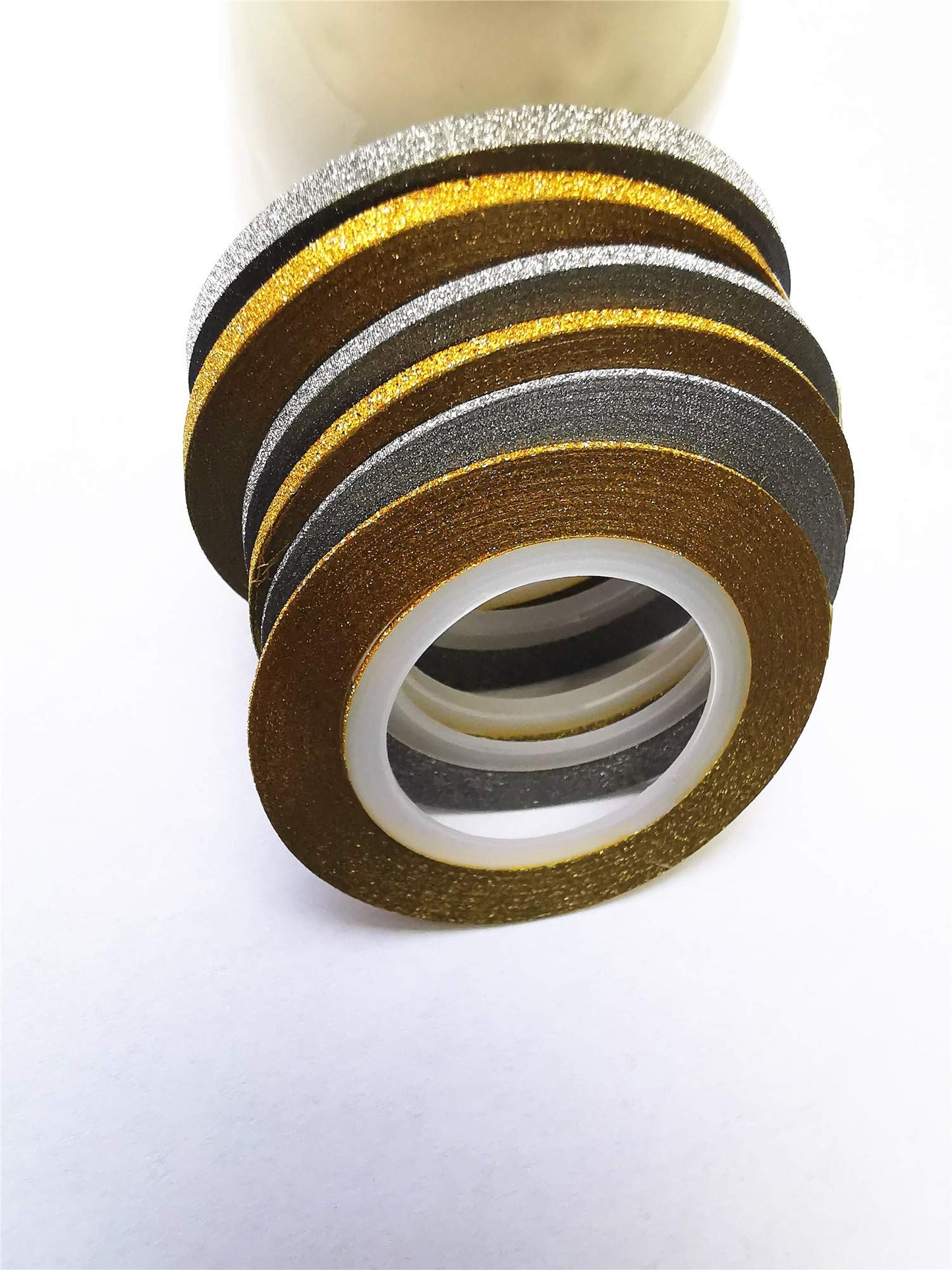 Self-adhesive glitter nail stripping tape application example