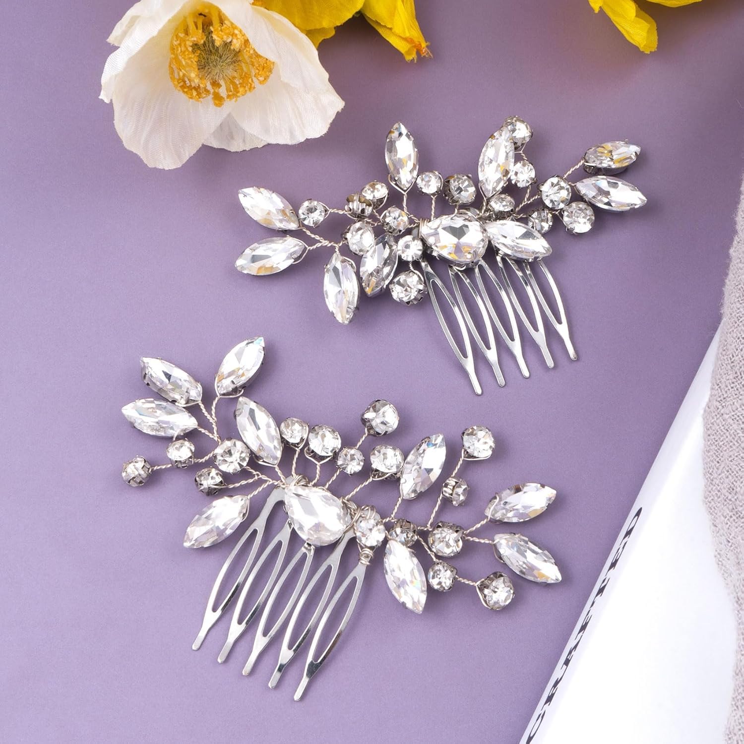 Close up of crystal flower side hair comb detailing premium metal teeth