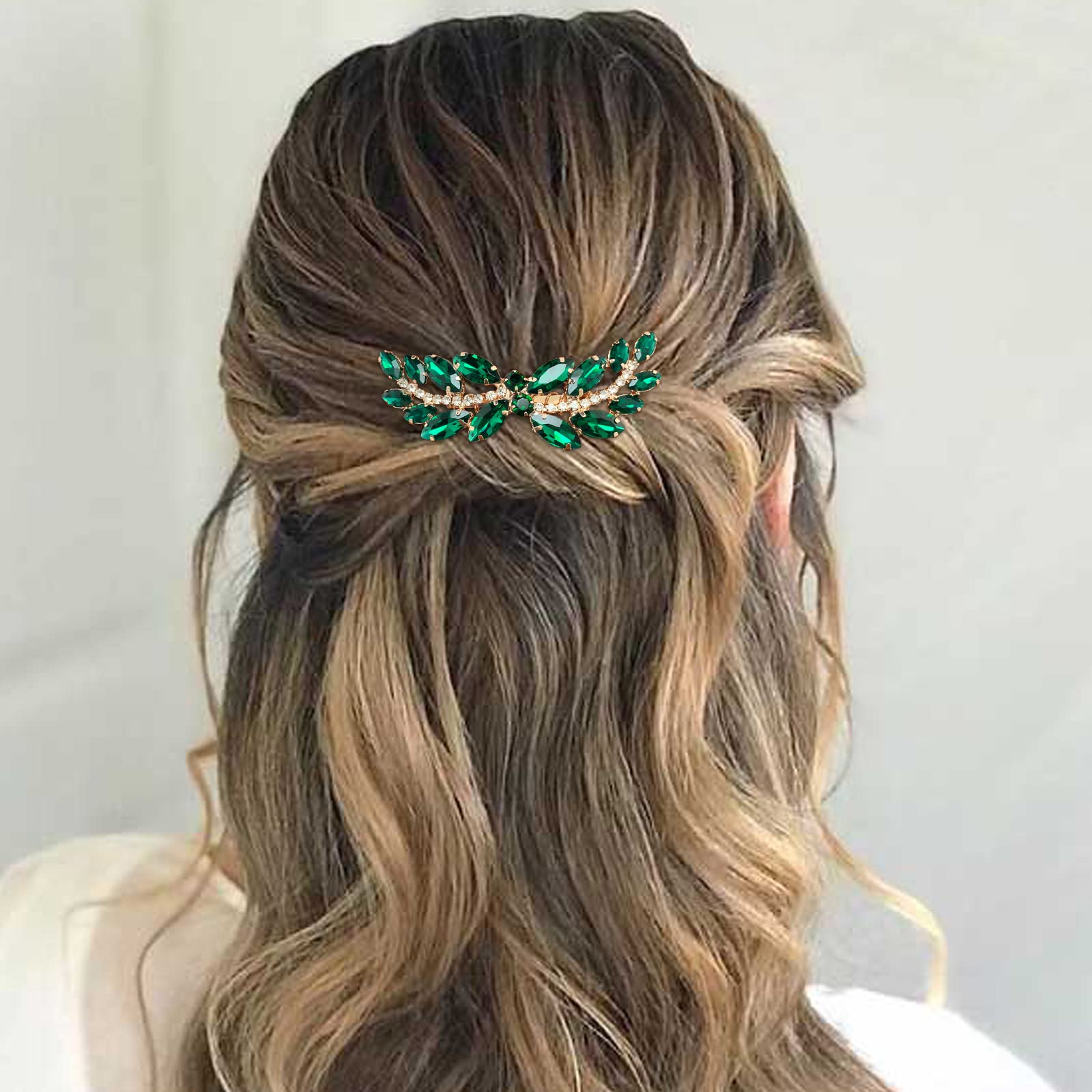 BETITETO wedding rhinestone hair piece placed elegantly on a bridal updo hairstyle
