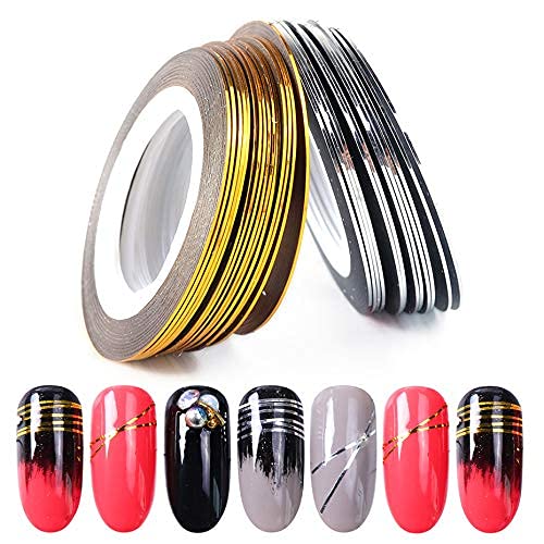 Close up of metallic gold and silver nail striping tape rolls