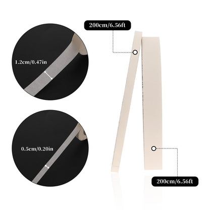 Removable white paper painter tape being peeled back smoothly to demonstrate zero residue transfer.