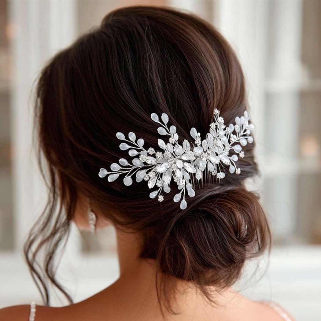 Elegant silver wedding hair jewelry for women resting on a clean display surface.