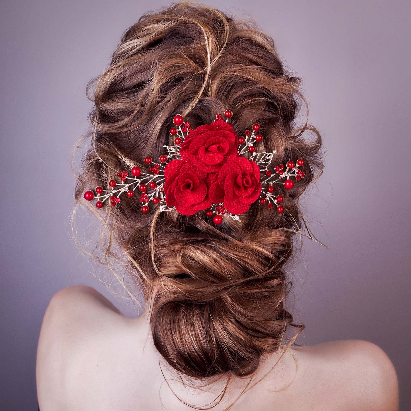 Detailed close up of the artificial red roses and wired crystal accents.