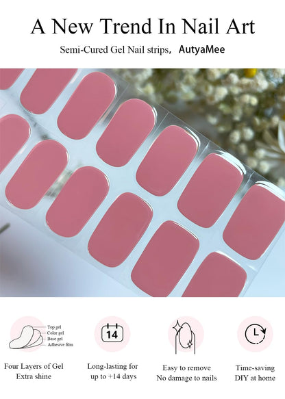 Curing the dusty rose gel nail strips under a portable UV LED lamp