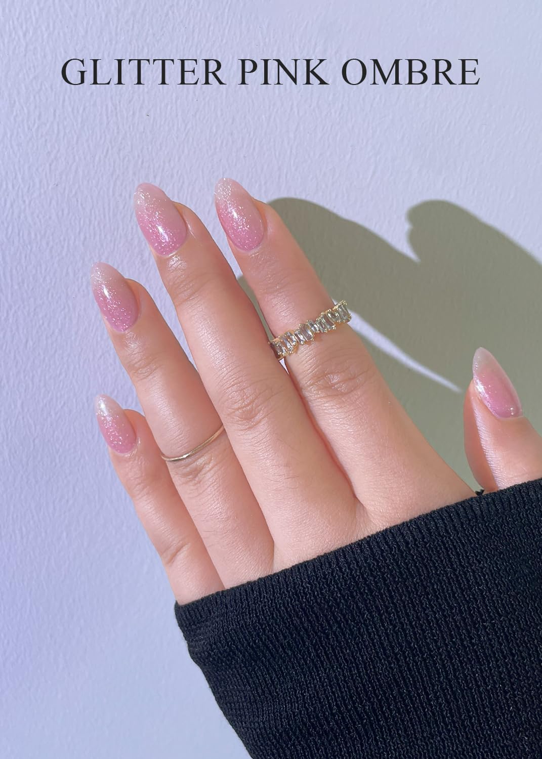Glitter pink ombre semi-cured gel nail stickers kit laid out with twenty pieces in ten sizes