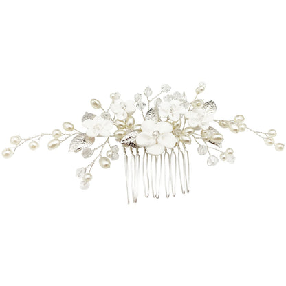 PrettyLife floral hair pin accessory positioned on an elegant bridal updo.