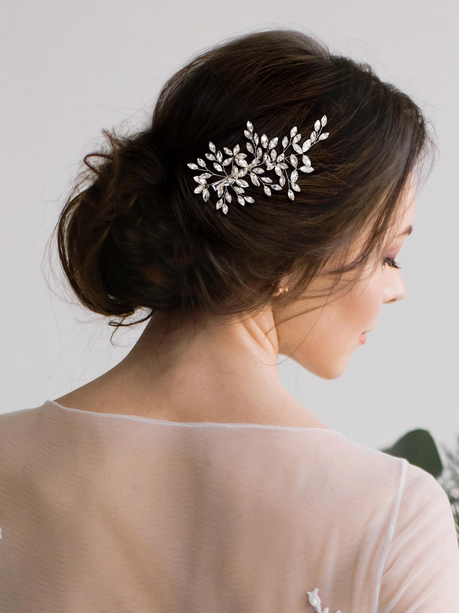 Handmade bridal hair side piece with sparkling rhinestones and pearls closeup