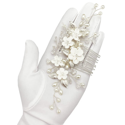 White flower silver leaf hair jewelry packaging view for brides.