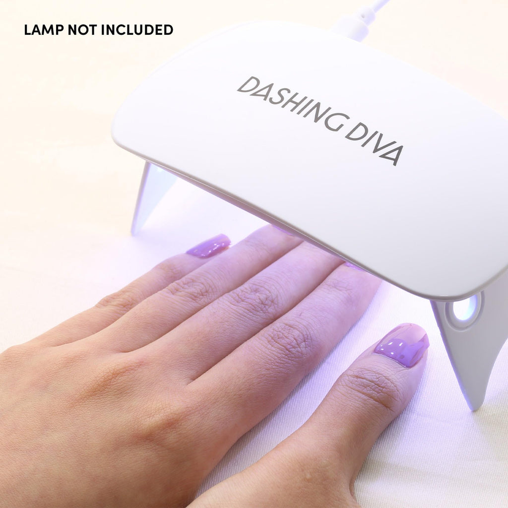 Dashing Diva box packaging with included prep pads and nail file