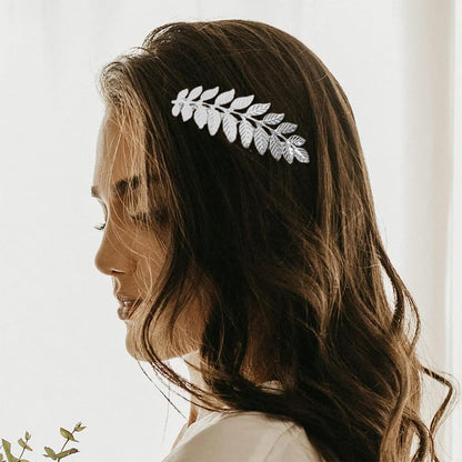 Six different styles of PAGOW gold leaf branch and butterfly shape hair accessories displayed together.