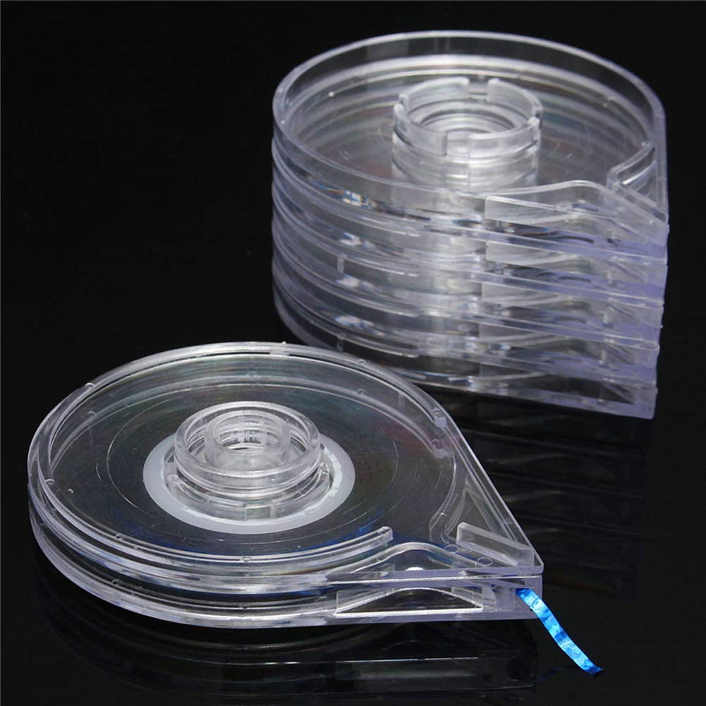 Close up of clear plastic nail art tape roller dispenser