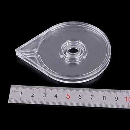 Detail shot of the teardrop-shaped tape dispensing opening