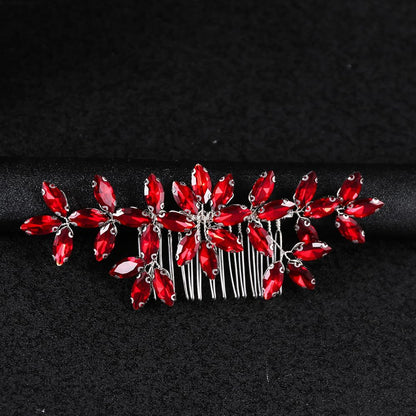Side view of Arvintas ruby red crystal hair accessory showing comb teeth mechanism