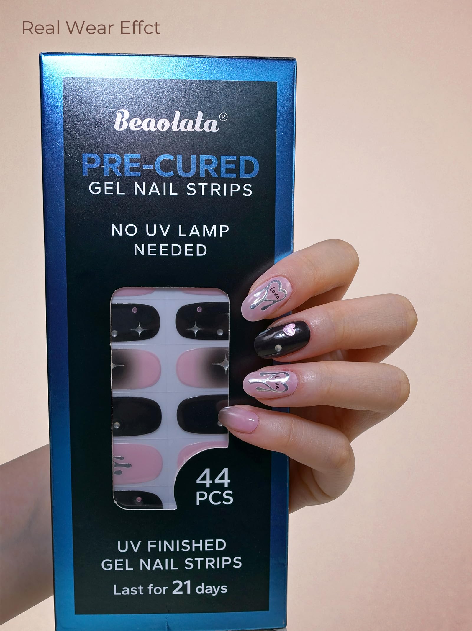 Close up view of the minimalist white design on applied nail wraps