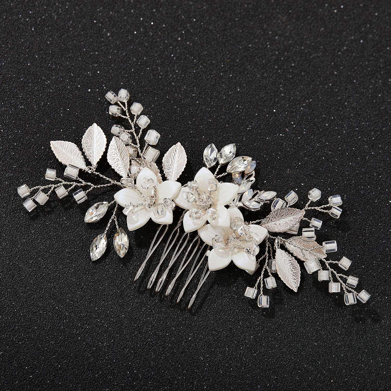 Elegant SWEETV silver crystal hair accessory placed elegantly above a bridal updo hairstyle.