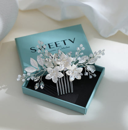 SWEETV crystal and porcelain flower wedding headpiece styled in a half up and down hair look.