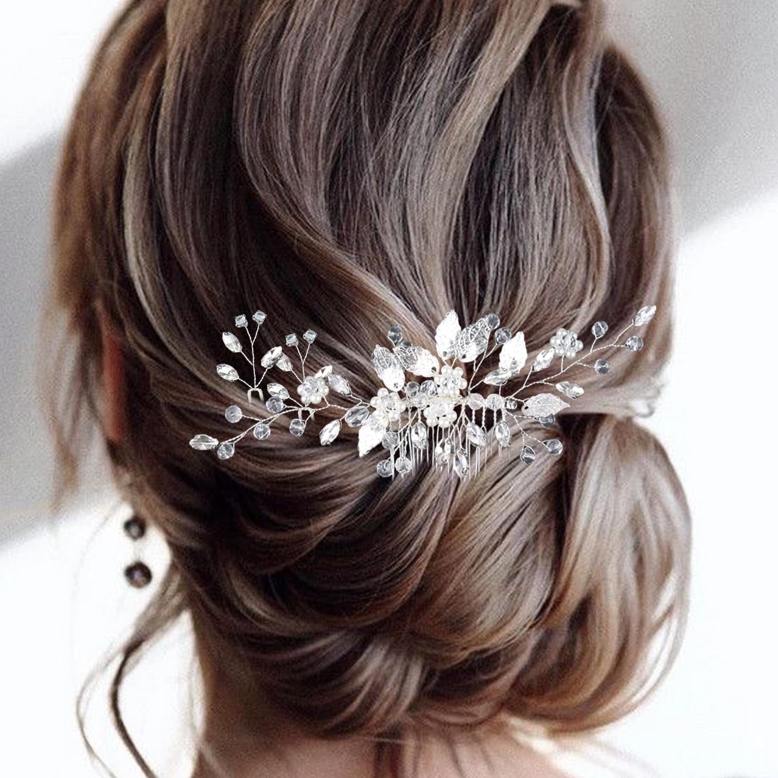Back view of the silver alloy bridal comb showing the secure placement teeth structure for wedding hairstyles